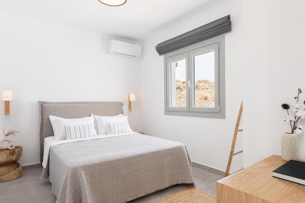 A bed or beds in a room at Villa Lefko