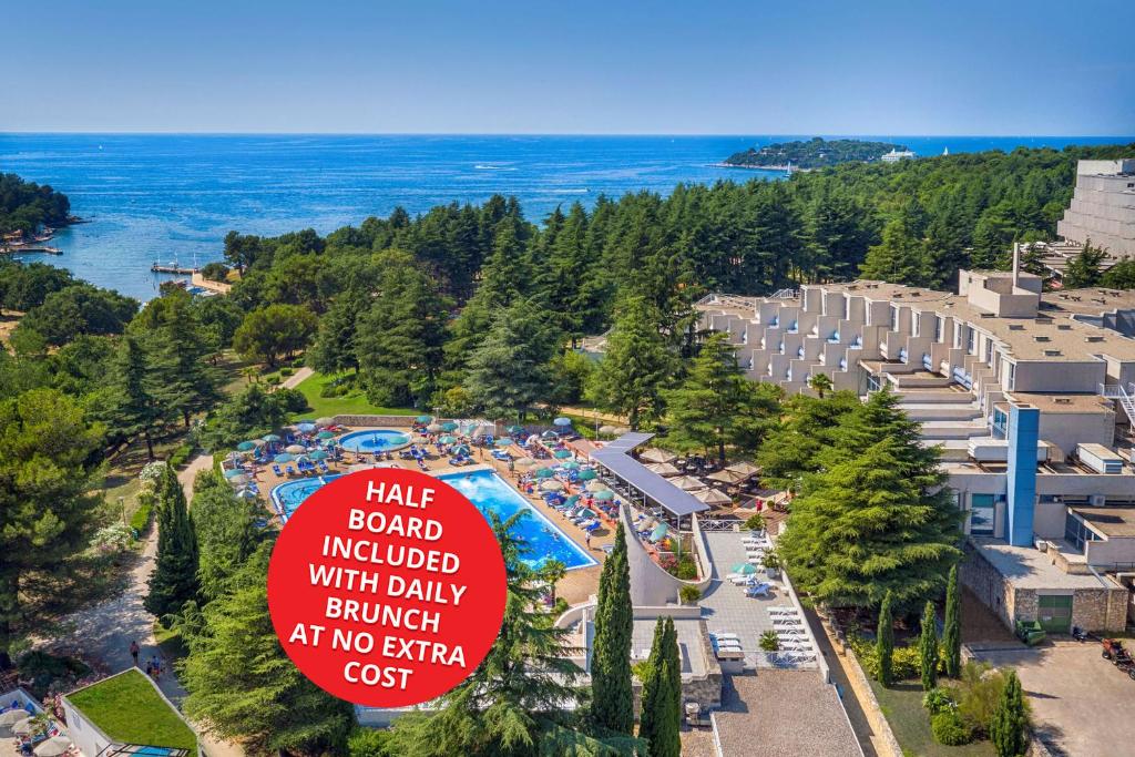 an overhead view of a resort with a sign at Crystal Sunny Hotel in Poreč