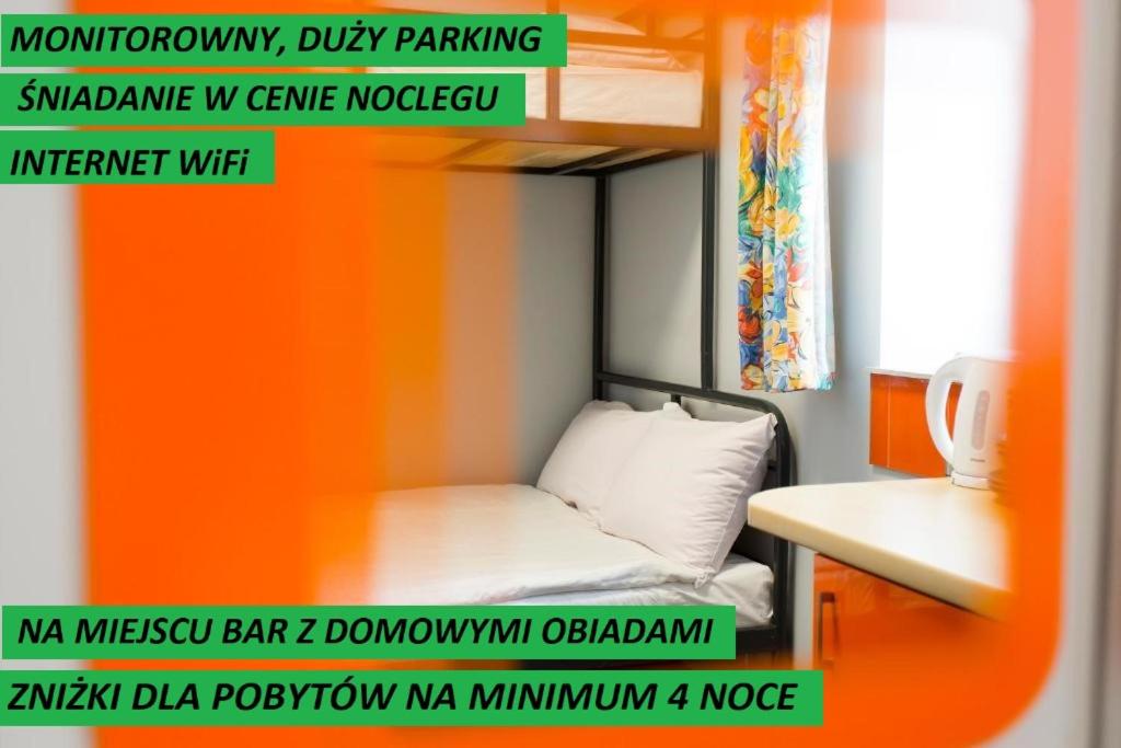 a poster of a bedroom with a bunk bed at Hostel Siennicka in Warsaw