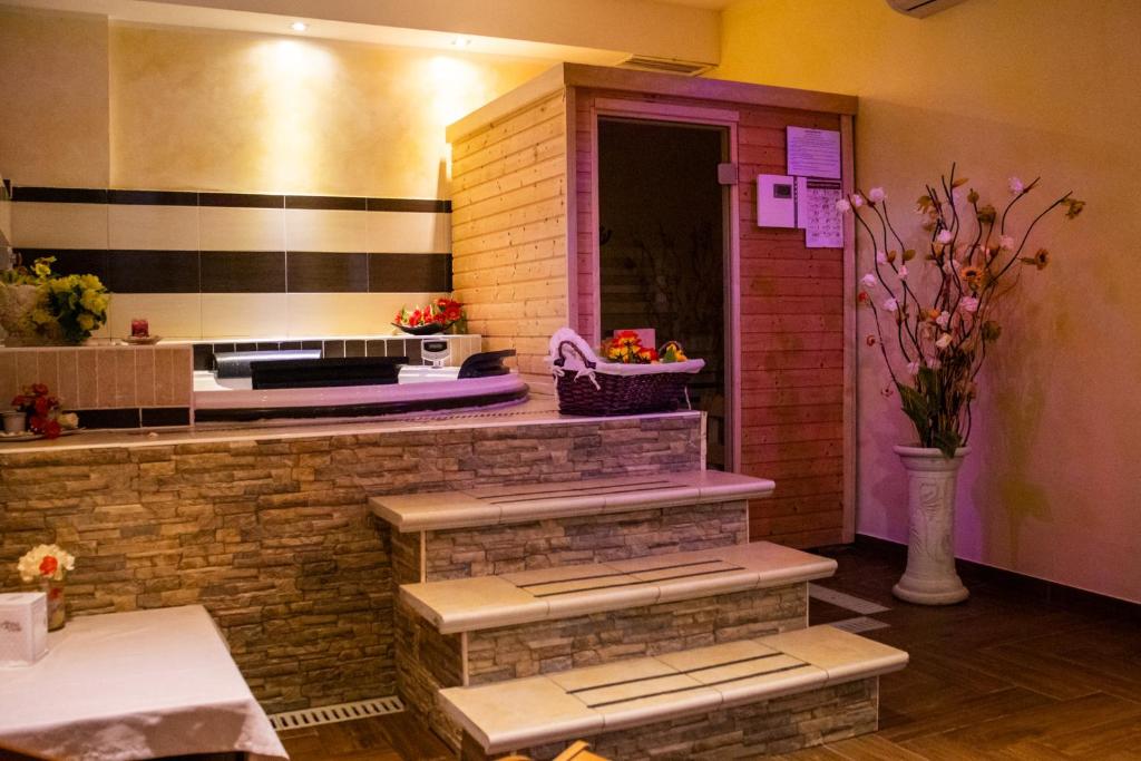 Kuchyň nebo kuchyňský kout v ubytování Hotel Paradiso