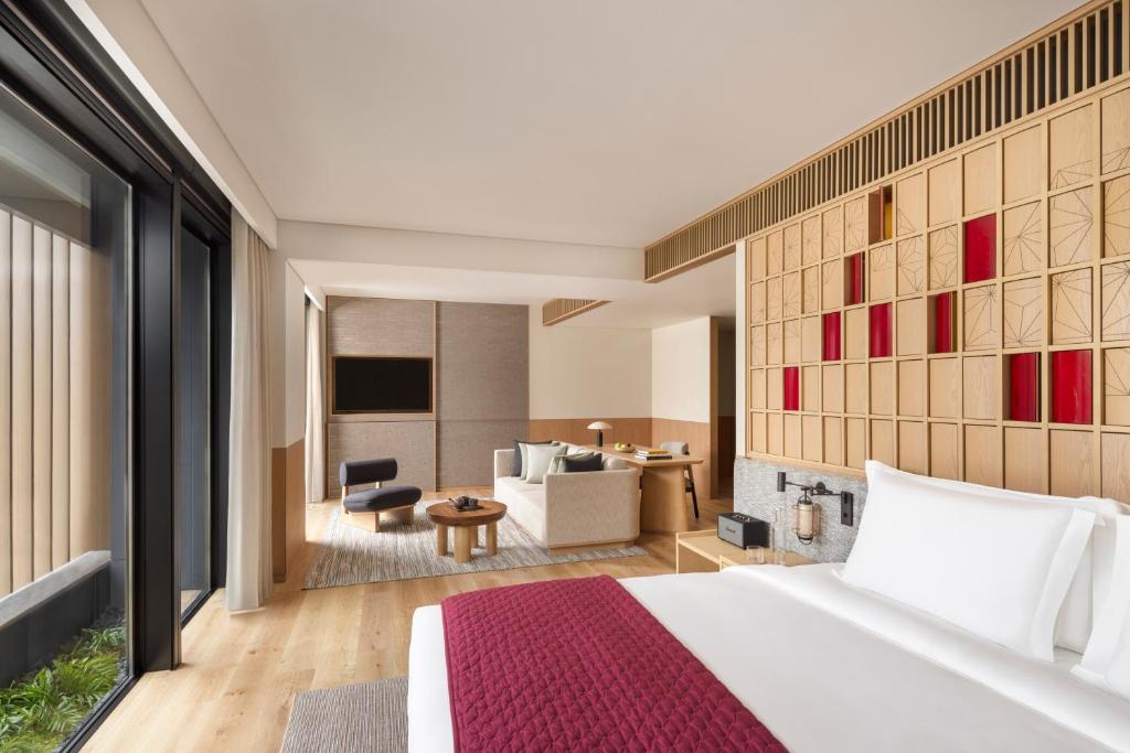 Postel nebo postele na pokoji v ubytování Six Senses Kyoto