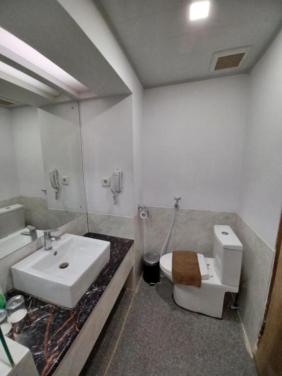 Koupelna v ubytování Abadi Hotel Malioboro Yogyakarta
