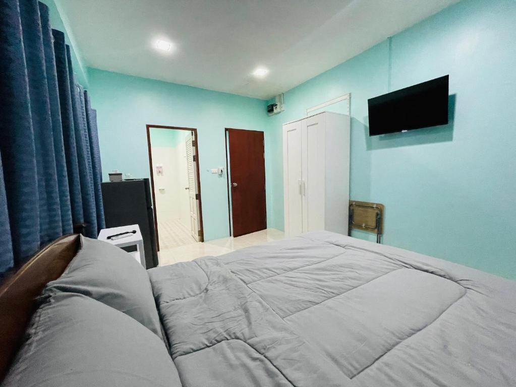 Postel nebo postele na pokoji v ubytování NUN GUEST HOUSE