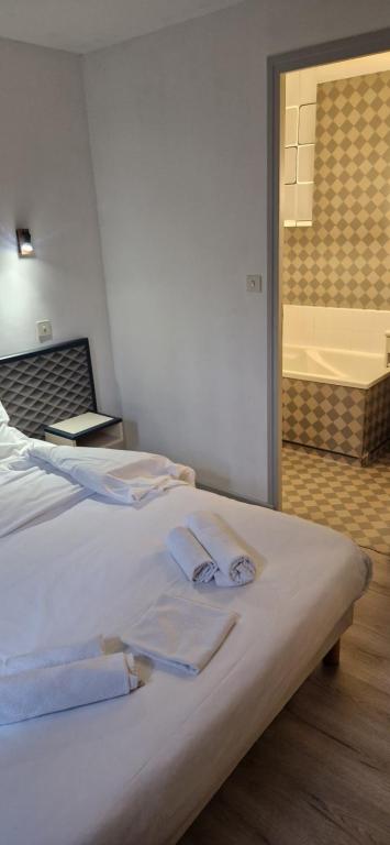 Postel nebo postele na pokoji v ubytování Hotel 1610