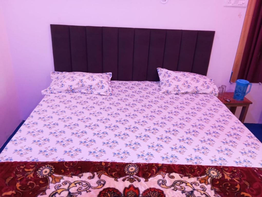 Postel nebo postele na pokoji v ubytování Atithi home stay and Cloud Kitchen