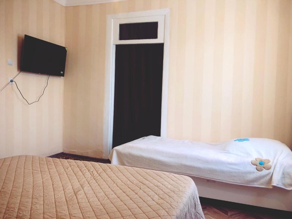 Postel nebo postele na pokoji v ubytování Family House Shorety