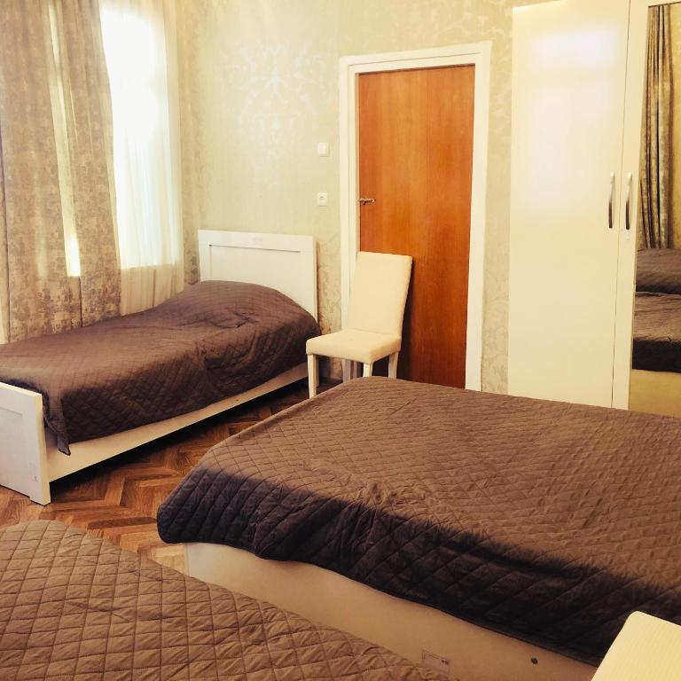 Postel nebo postele na pokoji v ubytování Family House Shorety