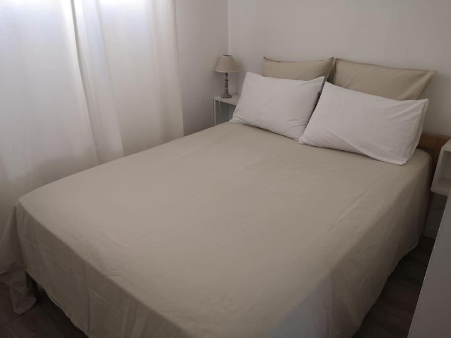 Lova arba lovos apgyvendinimo įstaigoje Appartement bord de plage