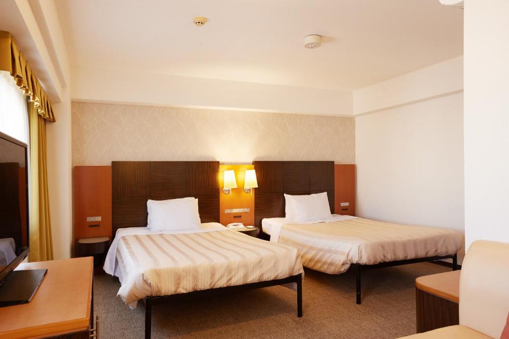 Lova arba lovos apgyvendinimo įstaigoje GRG Hotel Naha Higashimachi