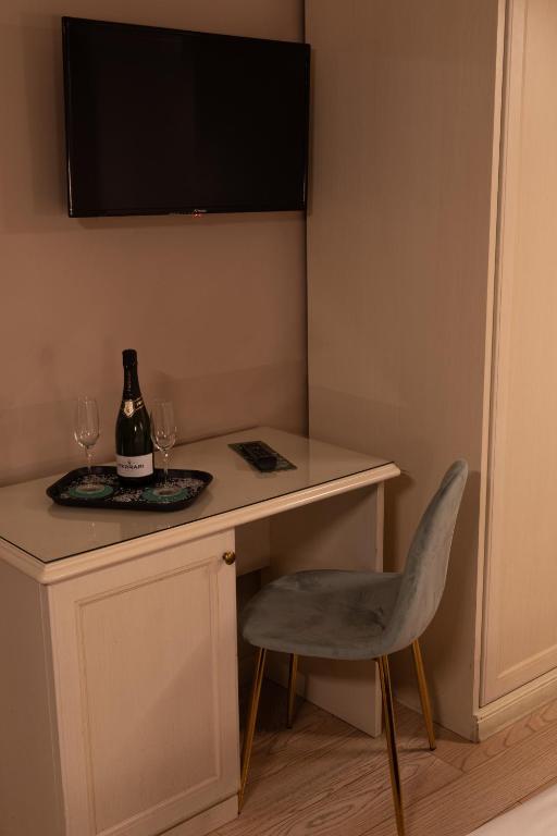 TV a/nebo společenská místnost v ubytování Hotel Santa Maura
