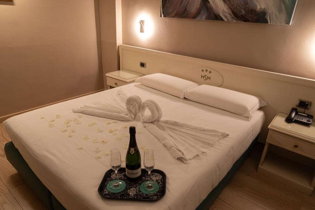 Postel nebo postele na pokoji v ubytování Hotel Santa Maura