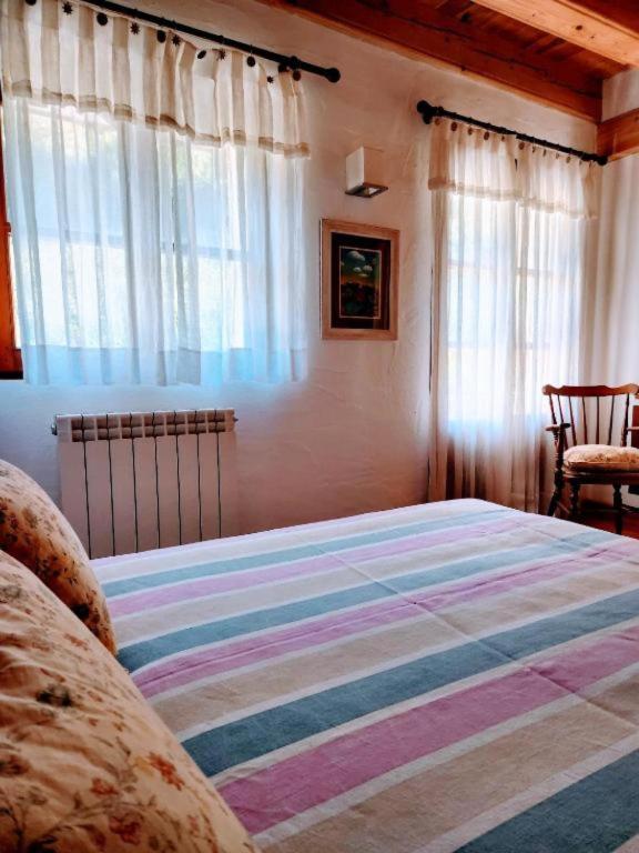 Postel nebo postele na pokoji v ubytování Casa Tadeguaz