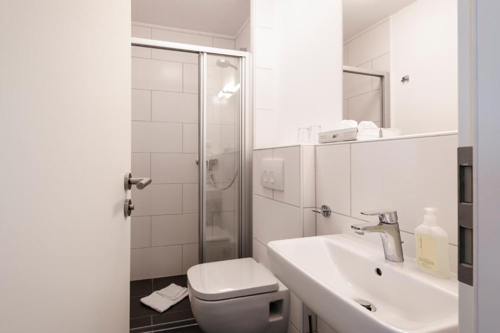 Koupelna v ubytování Hotel auf den Hummerklippen