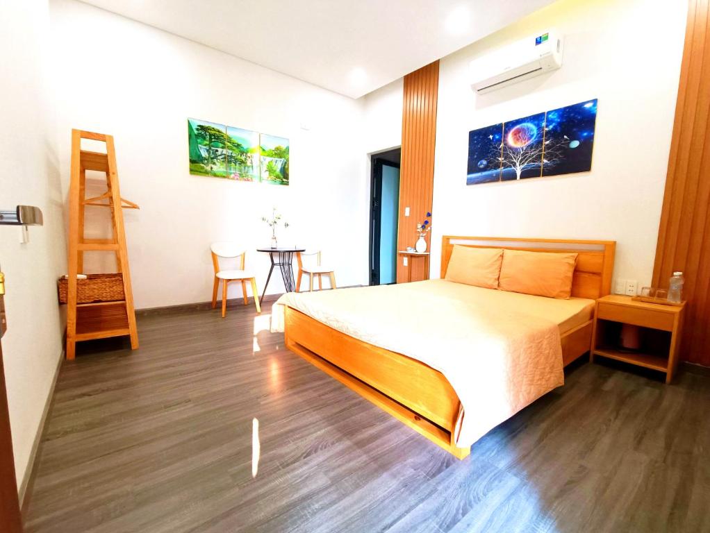 Postel nebo postele na pokoji v ubytování MyTran Homestay-HauLoan