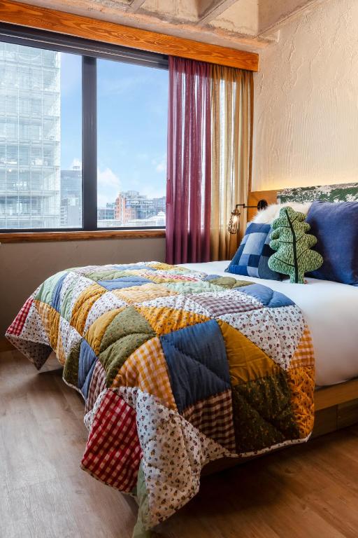 Postel nebo postele na pokoji v ubytování Treehouse Hotel Manchester