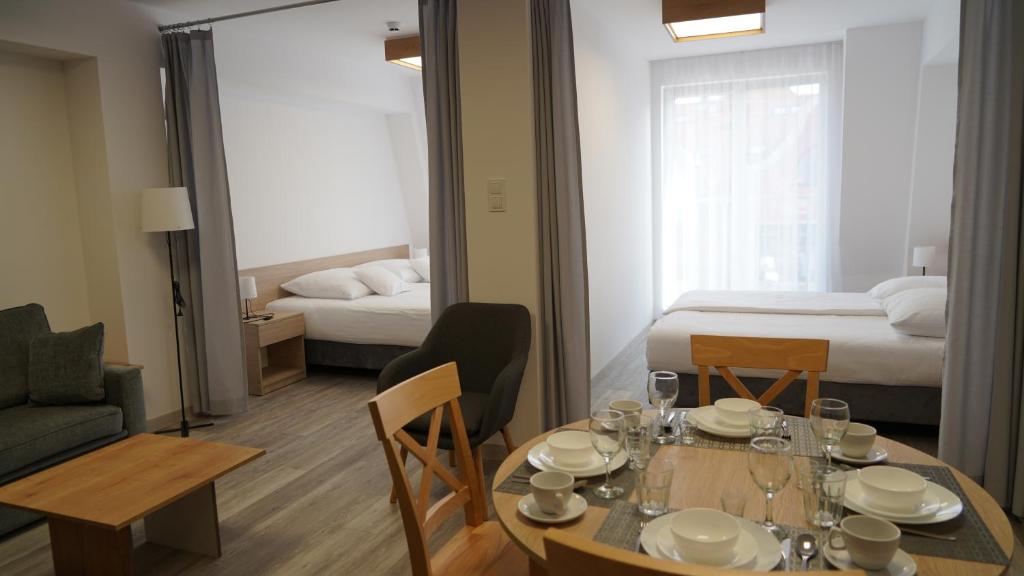 Postel nebo postele na pokoji v ubytování Apartament Aparthotel Passage