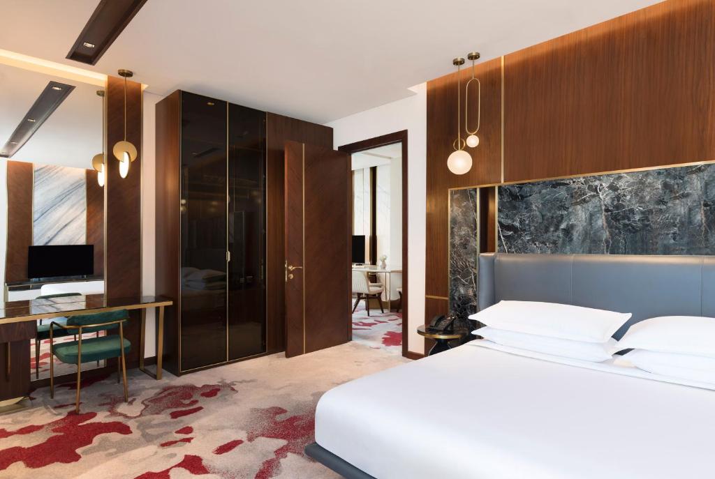 Postelja oz. postelje v sobi nastanitve Velero Hotel Doha Lusail