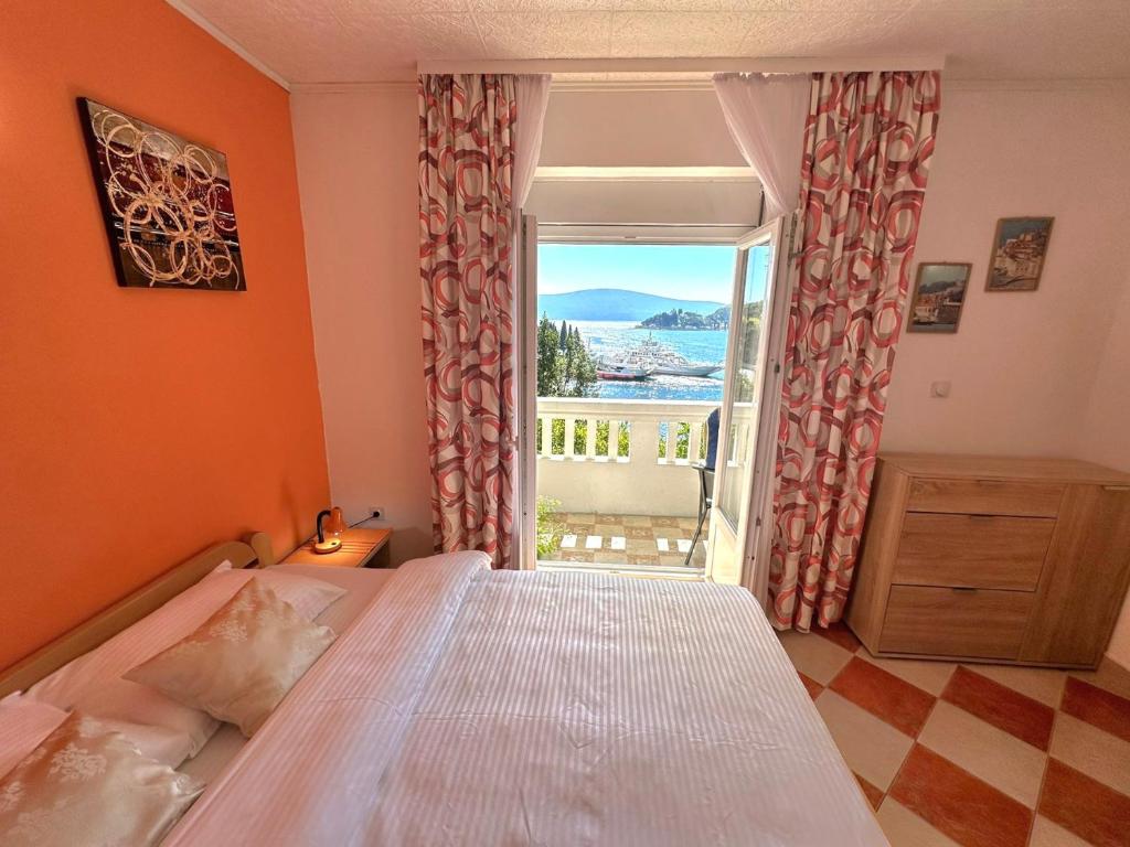 Postel nebo postele na pokoji v ubytování Apartments Okuka