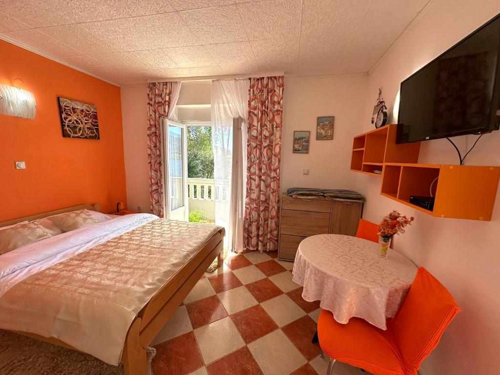 Postel nebo postele na pokoji v ubytování Apartments Okuka