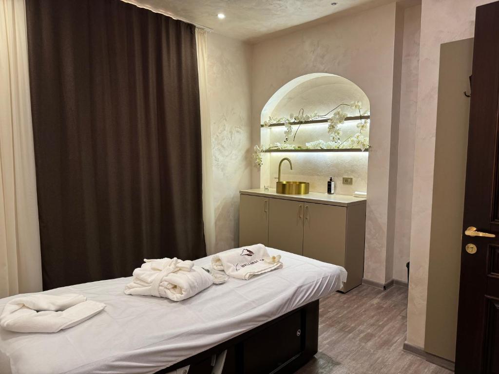 Кровать или кровати в номере Eighty Eight Deluxe Hotel & Spa