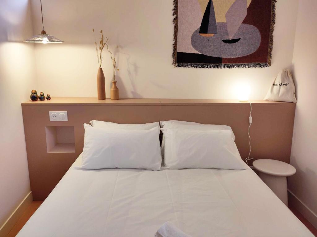 Postel nebo postele na pokoji v ubytování SLO Hostel Nice