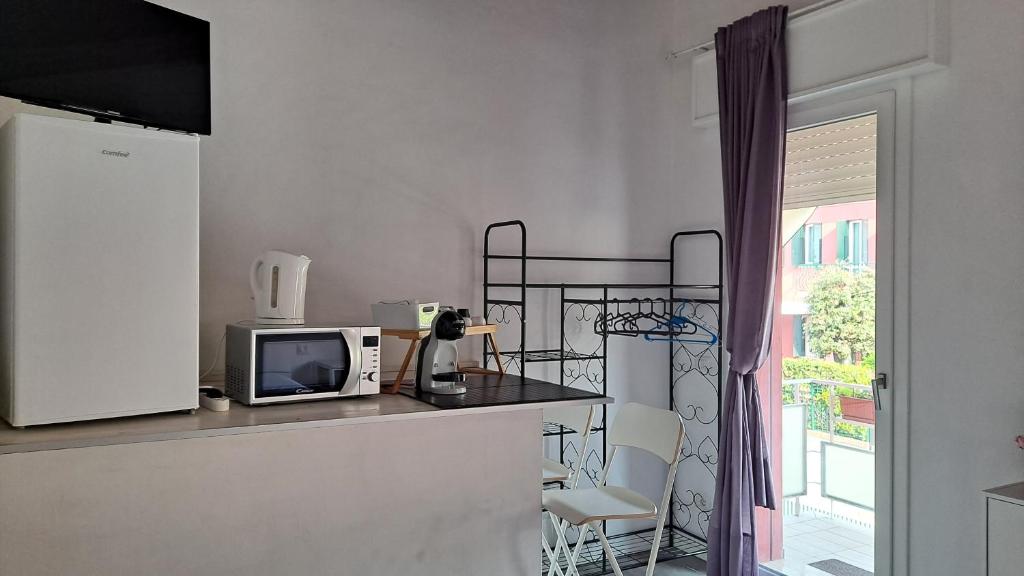 Kuchyň nebo kuchyňský kout v ubytování Appartamenti Monte Selce