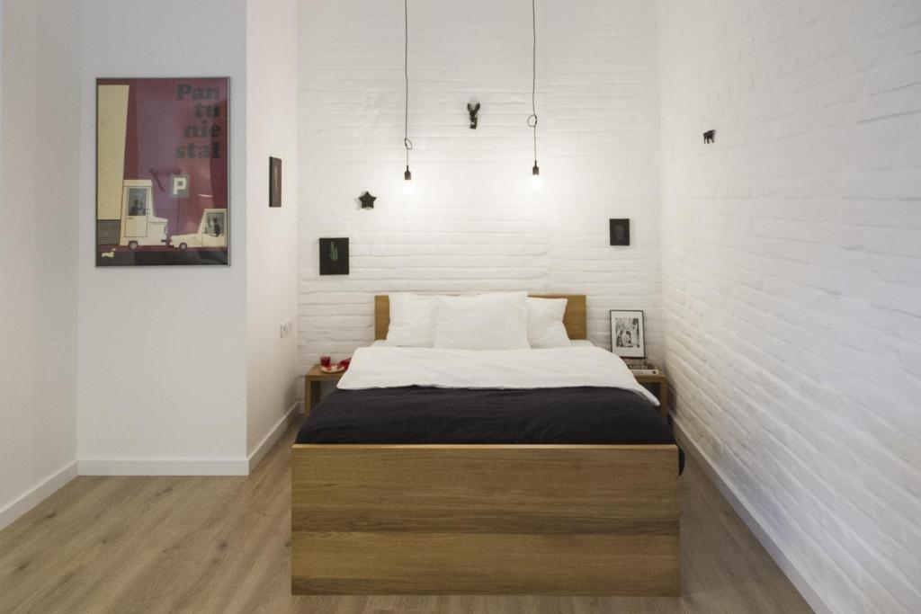 Posteľ alebo postele v izbe v ubytovaní Garden Studio