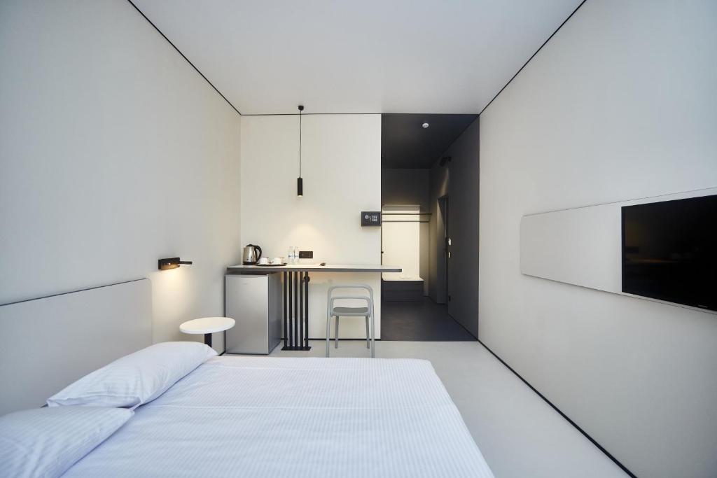 Kuchyň nebo kuchyňský kout v ubytování Ultramarinn Hotel
