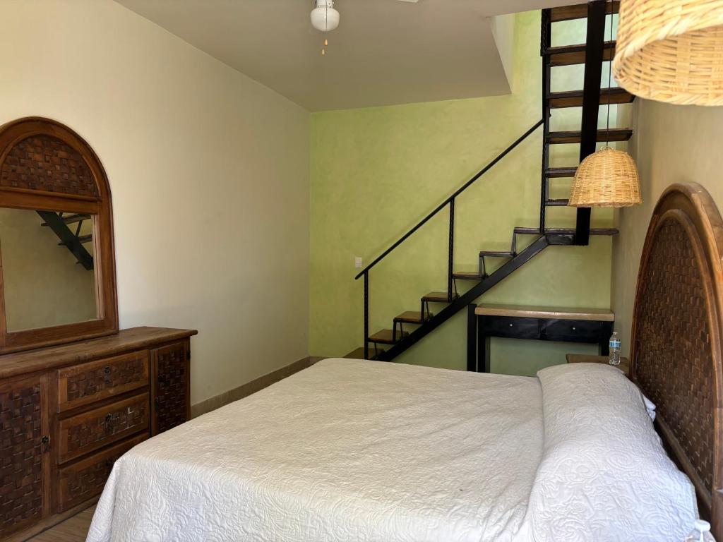 Postel nebo postele na pokoji v ubytování Frutos Hotel