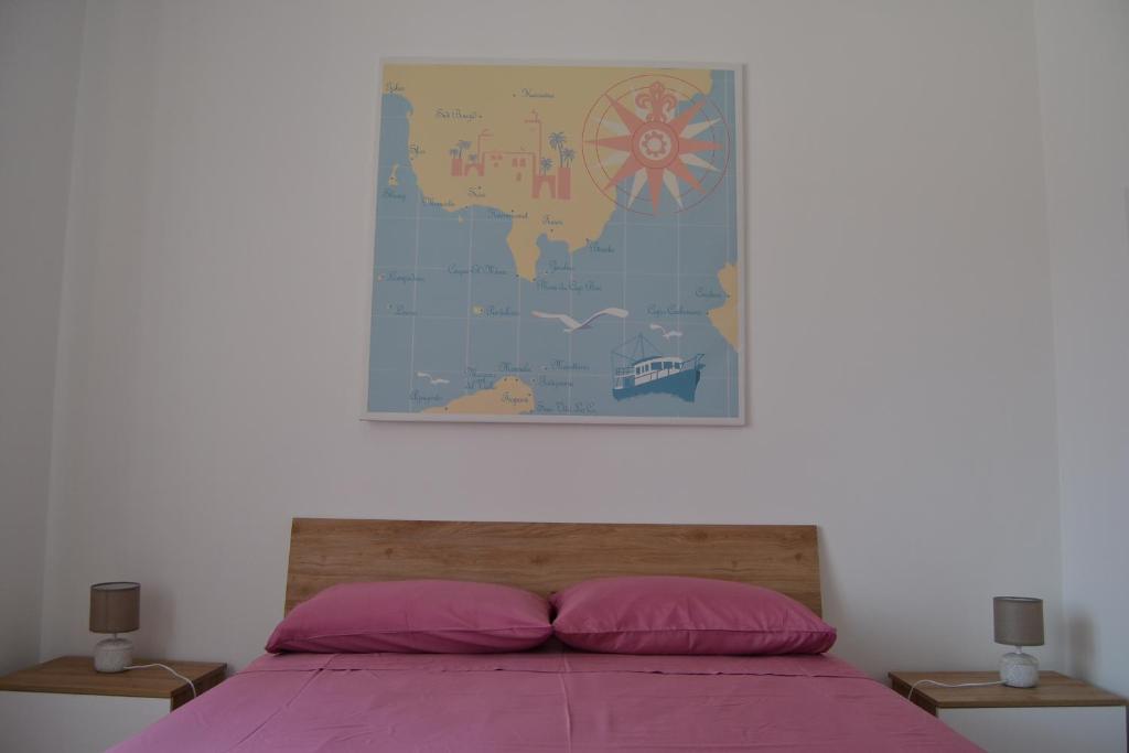 Postel nebo postele na pokoji v ubytování Redipuglia Apartment