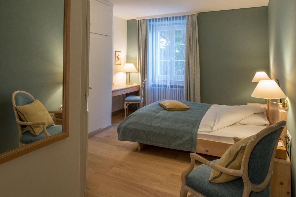 Letto o letti in una camera di Hotel Post