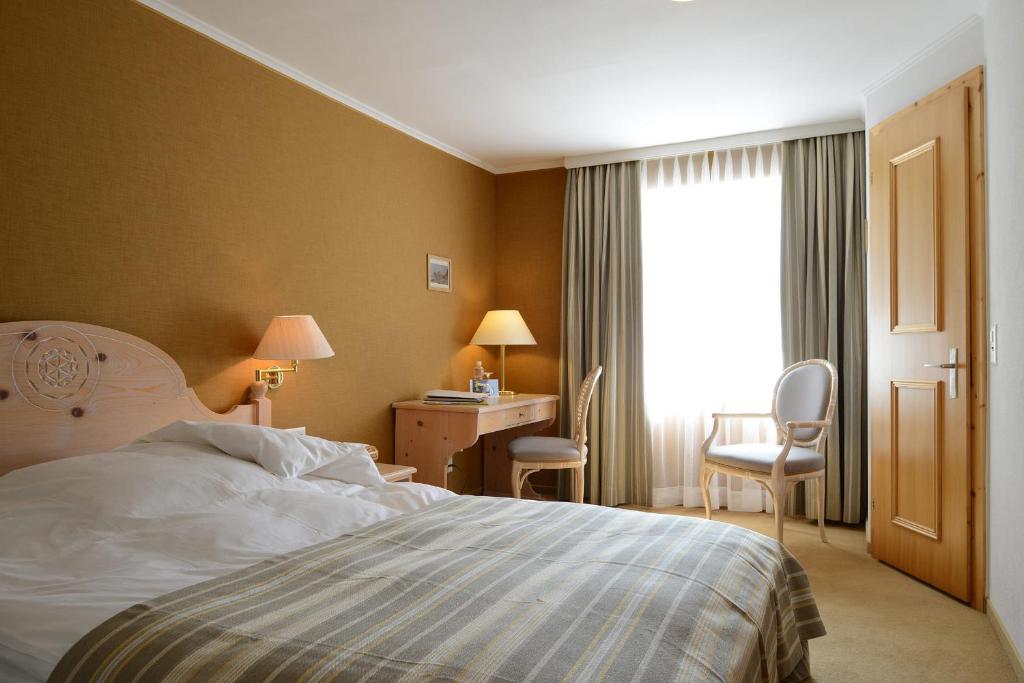 Letto o letti in una camera di Hotel Post