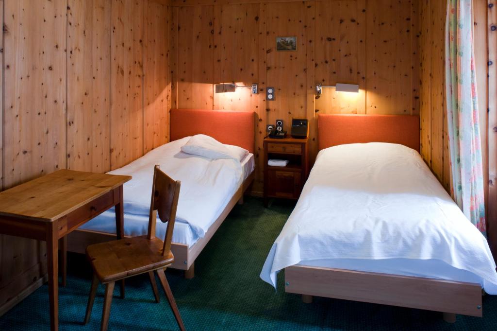 Letto o letti in una camera di Hotel Post
