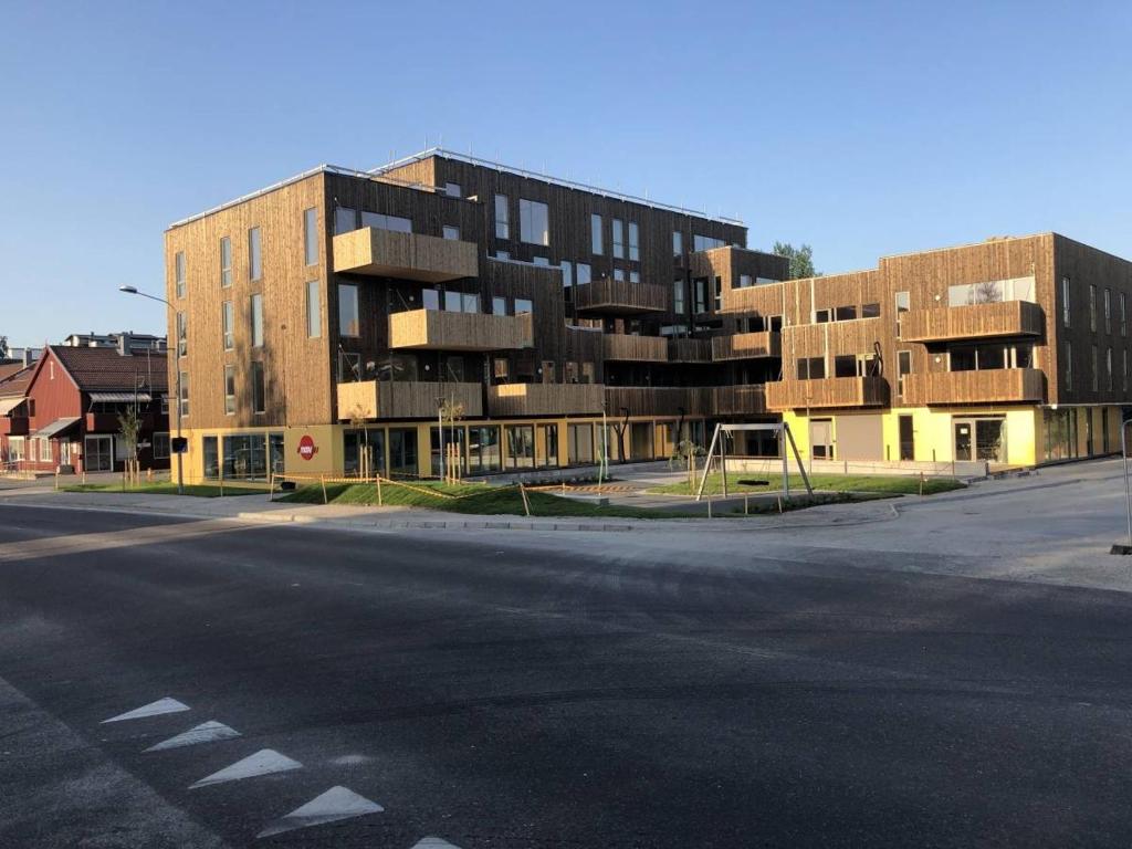 an empty street in front of a building at Folkestadvegen 23Q in Bø