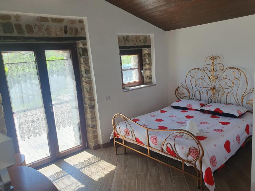 Posteľ alebo postele v izbe v ubytovaní Masseria Marotta