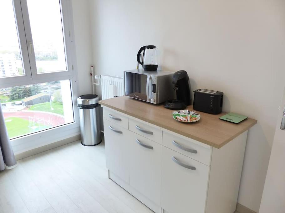 Cuisine ou kitchenette dans l'établissement VULCAIN 2, 18ème, Le toit de Vulcain, superbe vue