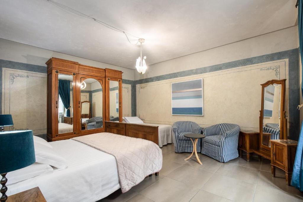 Postel nebo postele na pokoji v ubytování Asso Residence Narni