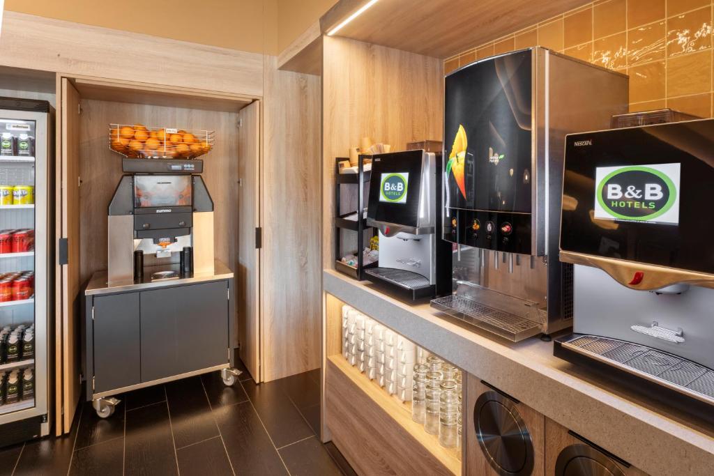 Kuchyň nebo kuchyňský kout v ubytování B&B HOTEL Écija