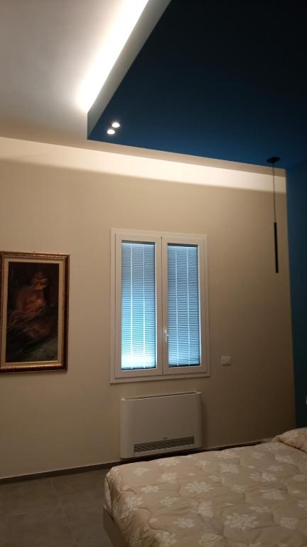 Voodi või voodid majutusasutuse Rosso Marsala toas
