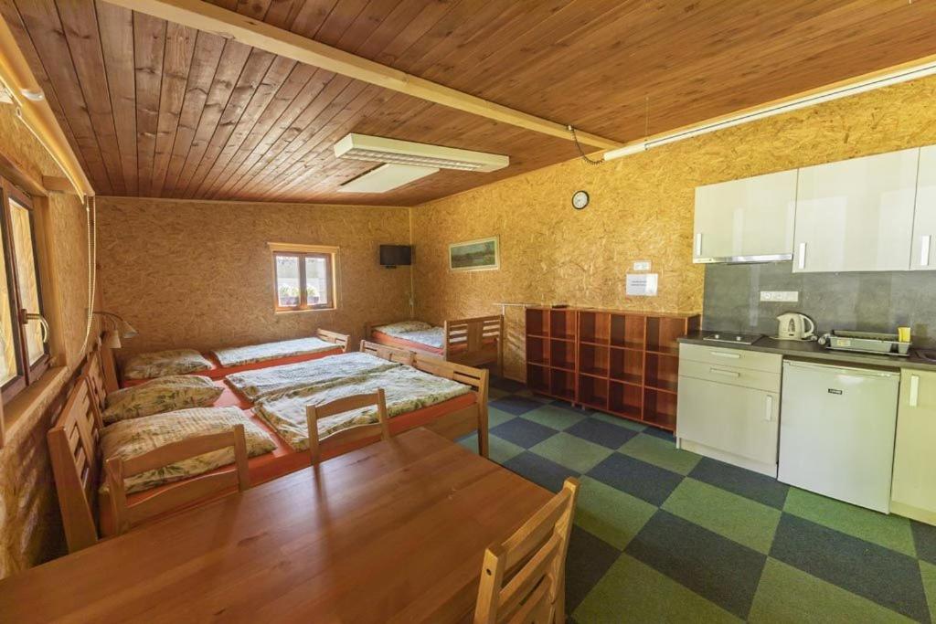 Postel nebo postele na pokoji v ubytování Ubytování Na Hrázi