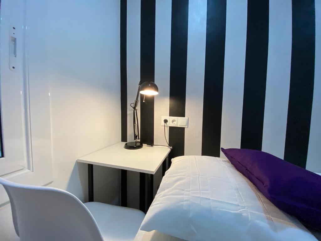 A bed or beds in a room at Besos Beach Gem II By MyRentalHost