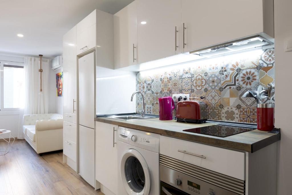 A kitchen or kitchenette at Besos Beach Gem II By MyRentalHost