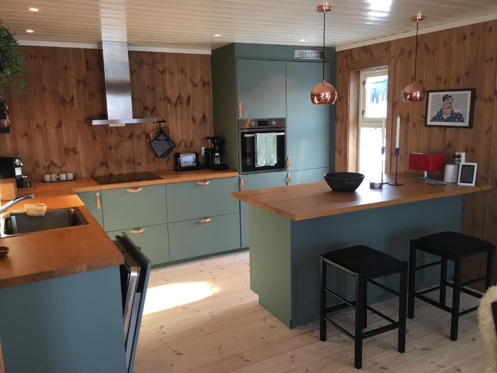 Kuhinja oz. manjša kuhinja v nastanitvi New and cozy family cabin on Golsfjellet