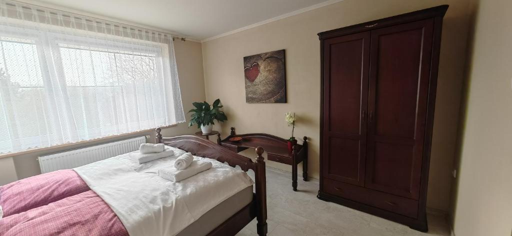 Postel nebo postele na pokoji v ubytování Apartmá Kanada