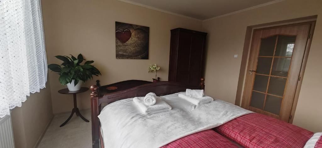 Postel nebo postele na pokoji v ubytování Apartmá Kanada