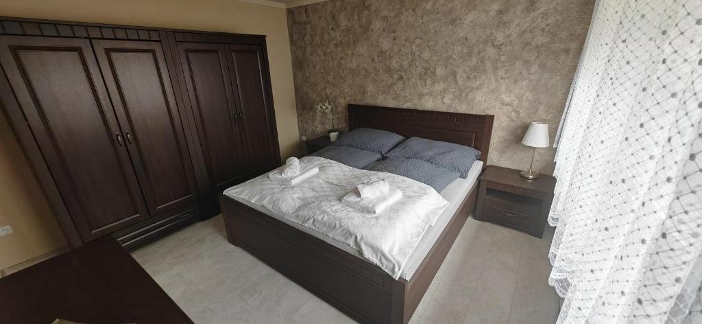 Postel nebo postele na pokoji v ubytování Apartmá Kanada