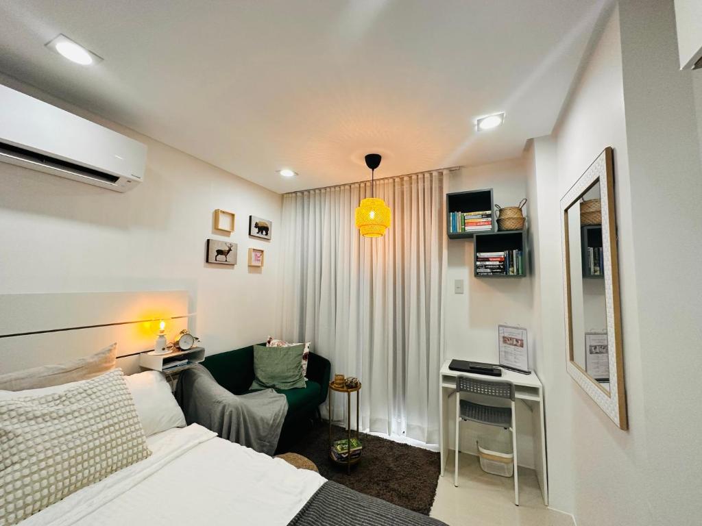 Voodi või voodid majutusasutuse Primo Condo Studio Type - One Pontefino Tower toas