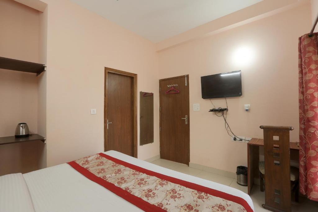TV a/nebo společenská místnost v ubytování Hotel Ginger Palace - Corporate Hotel Noida Sector 62