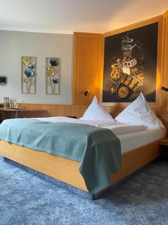 Postel nebo postele na pokoji v ubytování Hotel Louis Müller