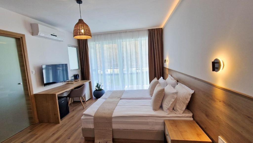 TV a/nebo společenská místnost v ubytování Waterside SPA Hotel